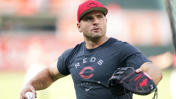 Reds first baseman Joey Votto throws a ball in warmups before a game.